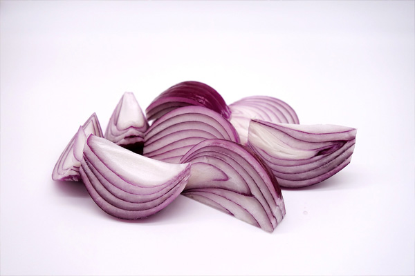 peeled red onion sliced